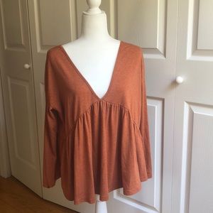 Burnt orange flowy top.